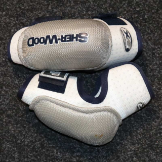 Hokejové lokty Sher-Wood X4 Junior